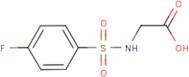 2-{[(4-Fluorophenyl)sulphonyl]amino}acetic acid