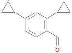 Benzaldehyde, 2,4-dicyclopropyl-