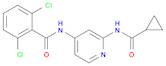 2,6-dichloro-N-(2-(cyclopropanecarboxamido)pyridin-4-yl)benzamide