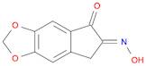 2-(hydroxyimino)-5,6-(methylenedioxy)-1-indanone