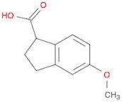 5-Methoxy-2,3-dihydro-1H-indene-1-carboxylic acid