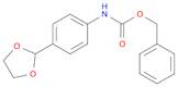 Carbamic acid, N-[4-(1,3-dioxolan-2-yl)phenyl]-, phenylmethyl ester