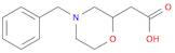 2-Morpholineacetic acid, 4-(phenylmethyl)-