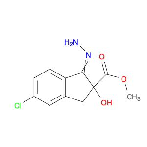 1H-Indene-2-carboxylic acid, 5-chloro-1-hydrazinylidene-2,3-dihydro-2-hydroxy-, methyl ester