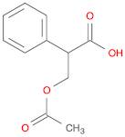 Benzeneacetic acid, α-[(acetyloxy)methyl]-