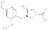 3-Pyrrolidinecarboxylic acid, 1-[(2,4-dimethoxyphenyl)methyl]-5-oxo-