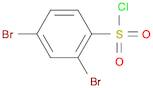 2,4-Dibromobenzene-1-sulfonyl chloride