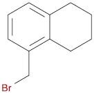 5-(Bromomethyl)-1,2,3,4-tetrahydronaphthalene