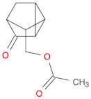 Tricyclo[2.2.1.02,6]heptanone, 5-[(acetyloxy)Methyl]- (9CI)