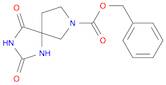 benzyl 2,4-dioxo-1,3,7-triazaspiro[4.4]nonane-7-carboxylate