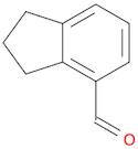 1H-Indene-4-carboxaldehyde, 2,3-dihydro- (9CI)