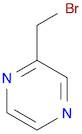 Pyrazine, (bromomethyl)- (9CI)