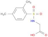 [[(2,4-DIMETHYLPHENYL)SULFONYL]AMINO]ACETIC ACID