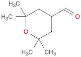 2,2,6,6-tetramethyloxane-4-carbaldehyde