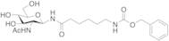 2-Acetamido-2-deoxy-N-[N-(benzyloxycarbonyl)-ε-aminocaproyl]-β-D-glucopyranosylamine