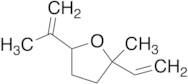 2-Ethenyl-2-methyl-5-prop-1-en-2-yloxolane