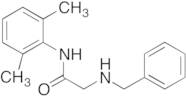 2-Benzylamino-2',6'-acetoxylidide