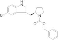 (R)-Benzyl 2-((5-bromo-1H-indol-3-yl)methyl)pyrrolidine-1-carboxylate