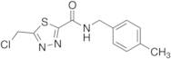 5-(Chloromethyl)-N-[(4-methylphenyl)methyl]-1,3,4-thiadiazole-2-carboxamide