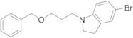 1-[3-(Benzyloxy)propyl]-5-bromoindoline