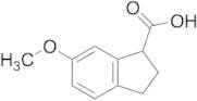 6-methoxy-2,3-dihydro-1H-indene-1-carboxylic Acid