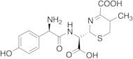 (2R)-2-((R)-((R)-2-Amino-2-(4-hydroxyphenyl)acetamido)(carboxy)methyl)-5-methyl-5,6-dihydro-2H-1,3…
