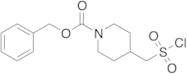 4-[(Chlorosulfonyl)methyl]-1-piperidinecarboxylic Acid Phenylmethyl Ester