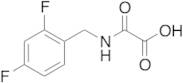 2-[[(2,4-Difluorophenyl)methyl]amino]-2-oxo-acetic acid