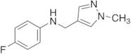 N-(4-Fluorophenyl)-N-[(1-methyl-1H-pyrazol-4-yl)methyl]amine