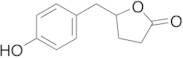 5-[(4-Hydroxyphenyl)methyl]oxolan-2-one
