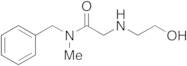 2-[(2-Hydroxyethyl)amino]-N-methyl-N-(phenylmethyl)-acetamide