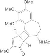 γ-Lumi (-)-Colchicine