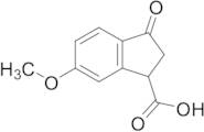 6-Methoxy-3-oxo-2,3-dihydro-1H-indene-1-carboxylic Acid