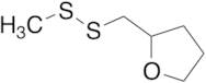 2-((Methyldisulfanyl)methyl)tetrahydrofuran