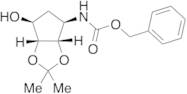 Phenylmethyl ester N-[(3aS,4R,6S,6aR)-tetrahydro-6-hydroxy-2,2-dimethyl-4H-cyclopenta-1,3-dioxol-4…
